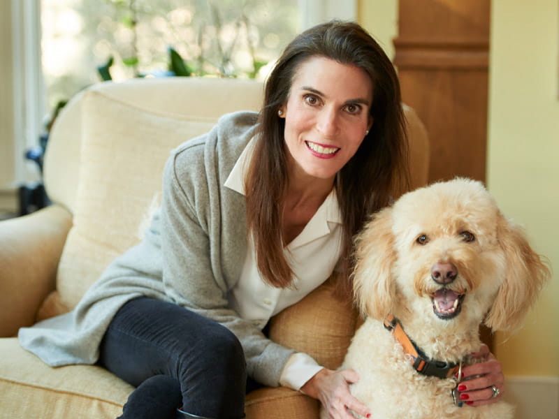 Dr. Beth Frates with her dog Reesee in 2018. Self-care has "got to be joyful," Frates says. "That could be a hike with a dog or a friend." (Photo courtesy of David Shopper)
