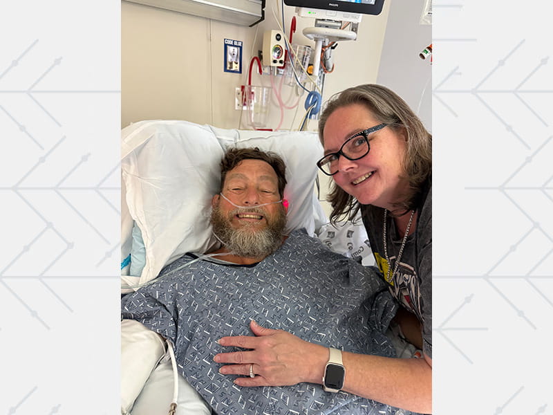 Bruce in the hospital with his oldest daughter Amy Deforest