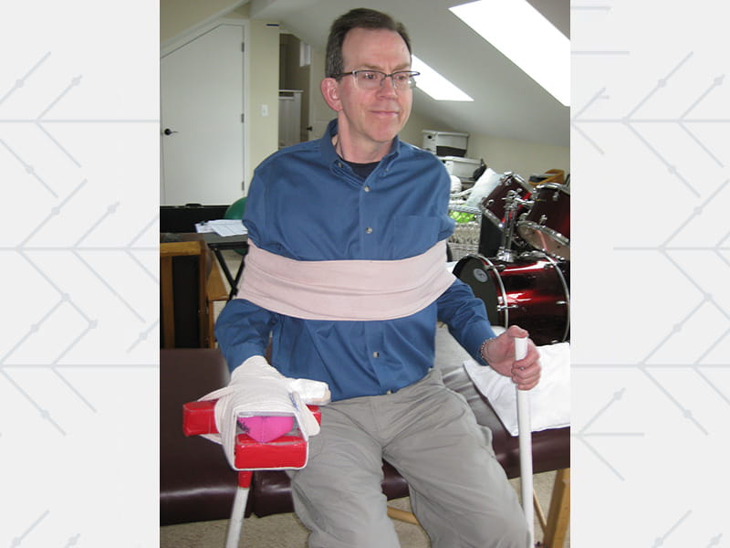 Brent Calhoun participating in physical therapy at a rehabilitation facility in 2013