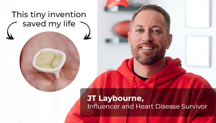 JT Laybourne smiling with an image of the device that saved his life