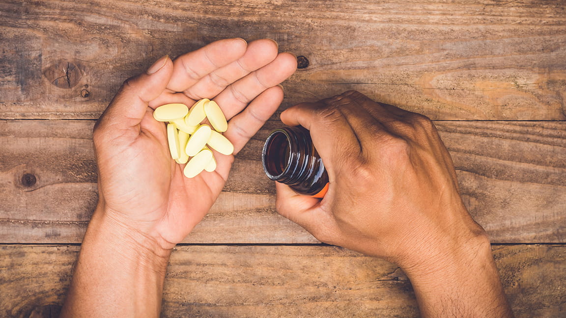 https://www.heart.org/-/media/AHA/H4GM/Article-Images/hand_pouring_vitamins_onto_hand.jpg