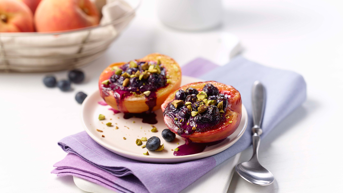 https://www.heart.org/-/media/AHA/Recipe/Recipe-Images/broiled-glazed-peaches-stuffed-blueberry-compote-cream-cheese-sized.jpg