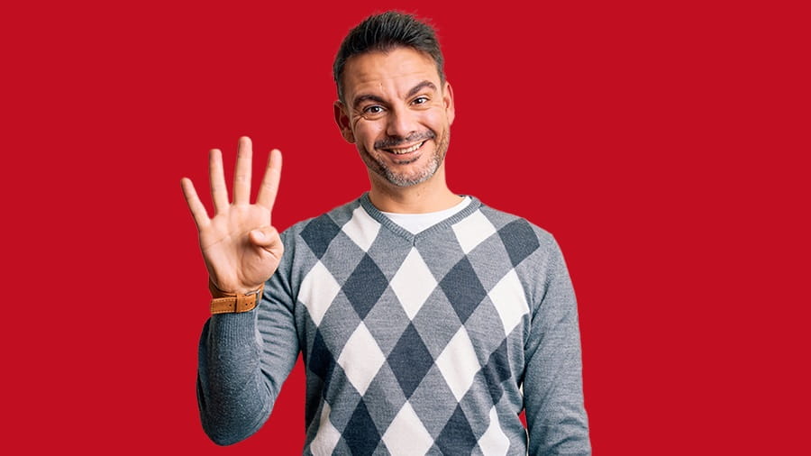 Man holding up 4 fingers