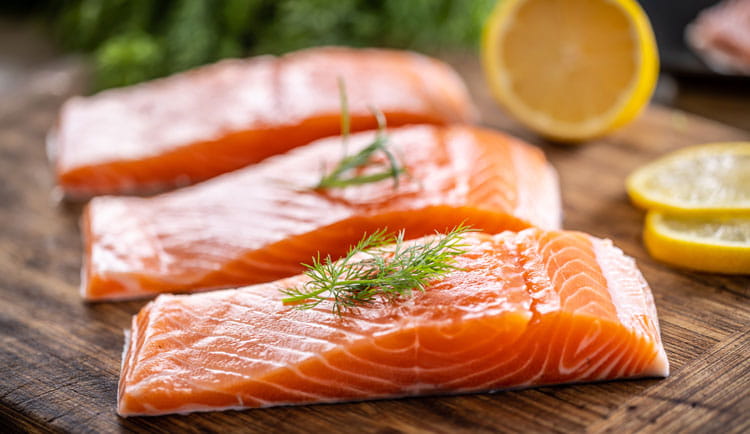 https://www.heart.org/-/media/Healthy-Living-Images/Healthy-Eating/salmon_fish_on_a_cutting_board.jpg