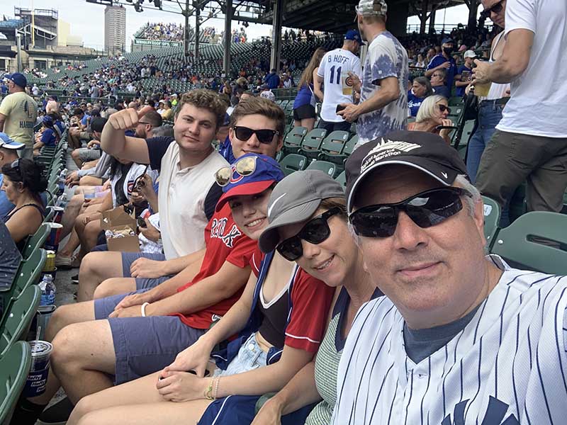 Donald Lloyd-Jones takes in a ballgame with (from right), his wife Dr. Kathleen McKibbin, and their children Caroline, Adam and Cameron.  (Photo courtesy of Donald-Lloyd Jones)