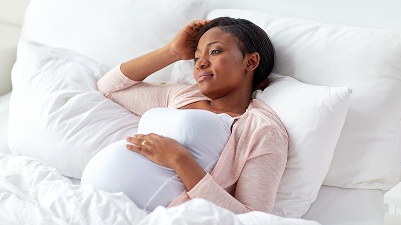 pregnant woman in bed