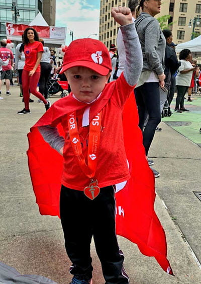 Jackson at AHA event wearing red cape