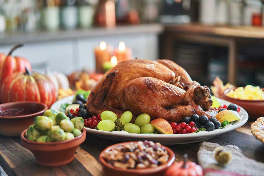 Table filled with Thanksgiving food