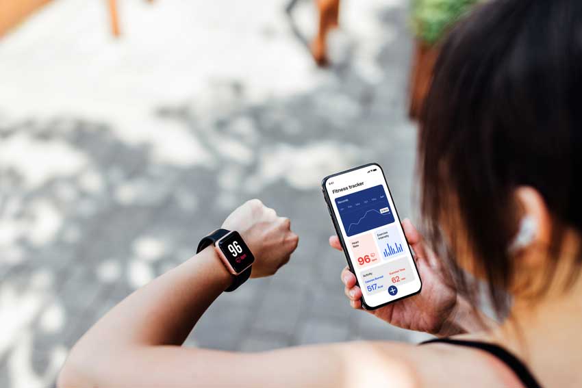 Woman looking at smart watch