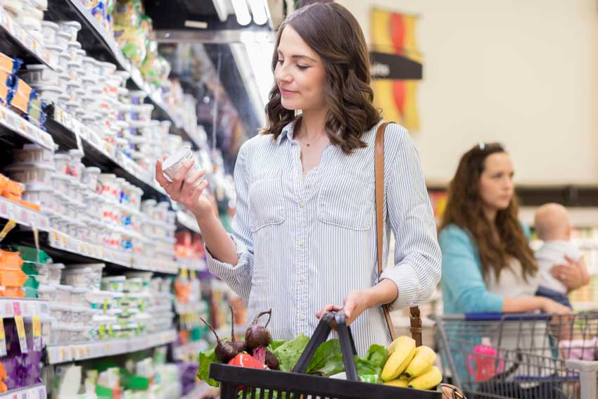 Woman shopping at grocery store