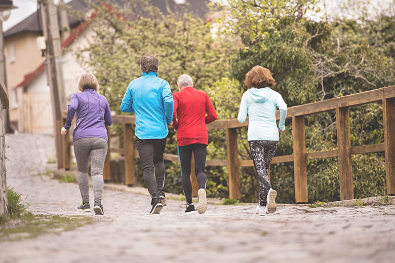 seniors running outdoors