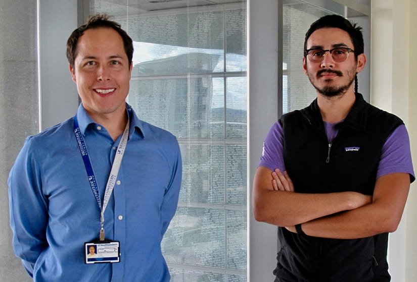 Dr. Alejandro Magadan (left), neurologist at UT Southwestern Medical Center in Dallas, with Cruz Ramirez (right), a Spanish-speaking professional medical interpreter at Dallas County's Parkland Memorial Hospital. (Photo courtesy of Margarita Birnbaum, AHA News)