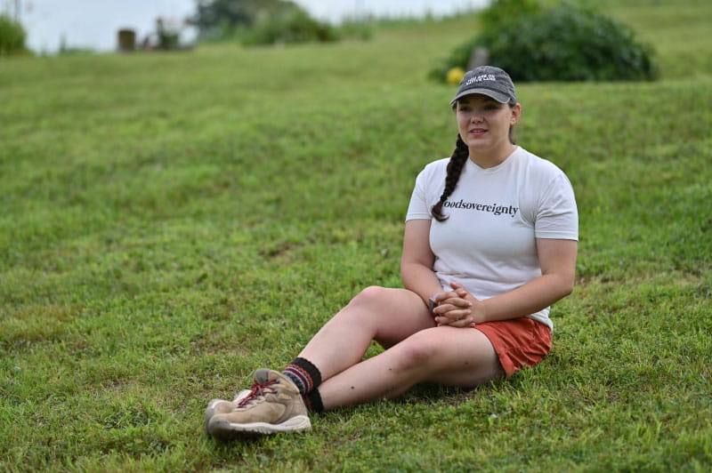 Tribe member Olivia Brien on the burial mound site where her third great-grandmother is buried. (Photo by Walter Johnson Jr./American Heart Association)