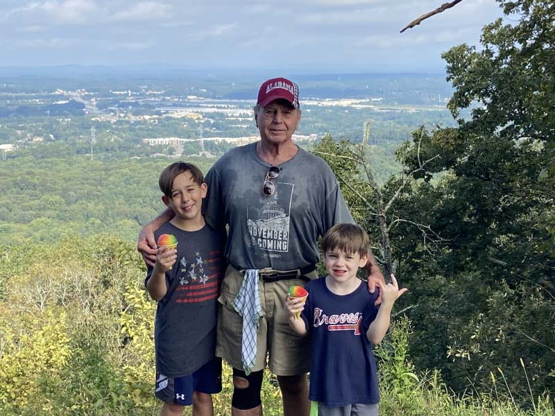 Bruce Dunning with grandsons Hudson, left, and Carter after hiking to the top of Kennesaw Mountain near Atlanta.