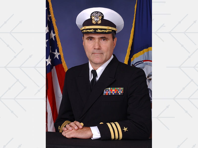 Carlos, shown in 2006, retired from the U.S. Navy with the rank of commander