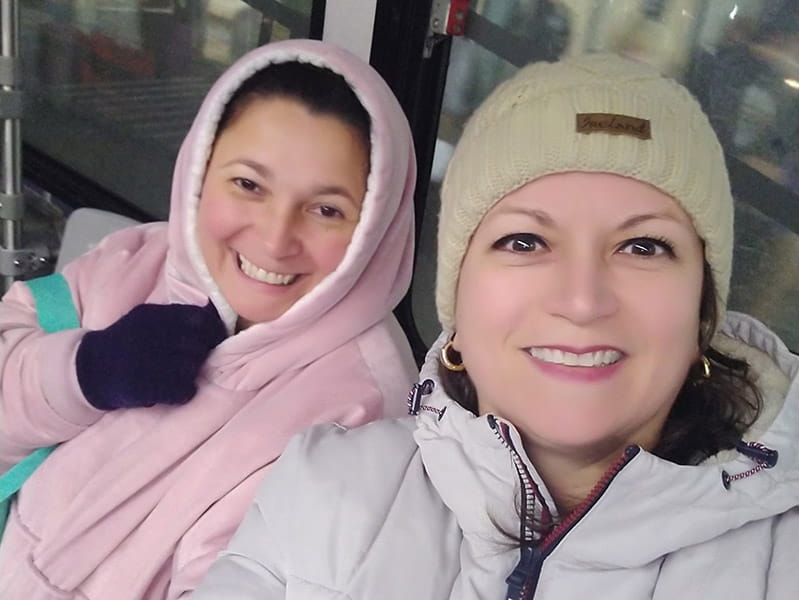 Ximena (left) and Monica, who live together in Florida, share a moment of bonding during their overnight trip.