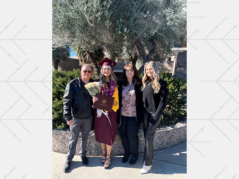 Alyssa Reader with dad Shawn, mom Natalie and sister Karli at her graduation from Arizona State in December 2022