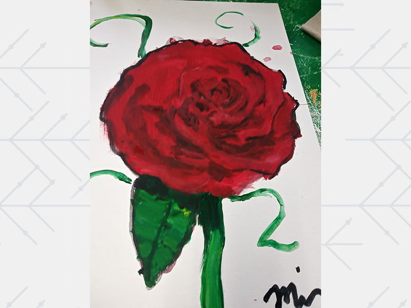 Minnie’s first painting after her stroke was this red rose.