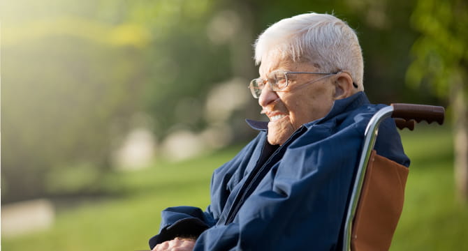 Lonely man with heart failure alone in wheelchair.