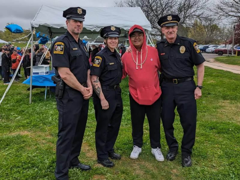 Jio Rodriguez with the police officers who helped save his life. From left: Officer Wayne Perritt, Officer Pamela Young, Rodriguez and Lt. Richard Homestead. (Photo courtesy of Richard Homestead)