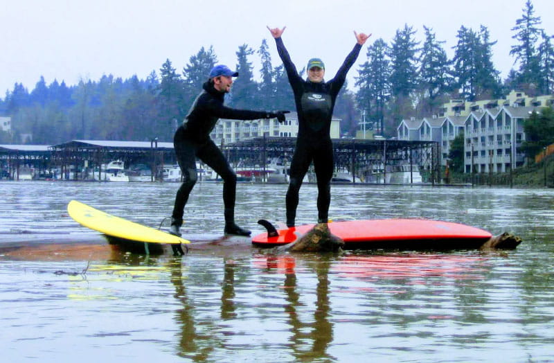 Tyson Yeck (left) and Max LeeKwai surfing on the Willamette River in Oregon in 2005. (Photo courtesy of Tyson Yeck)