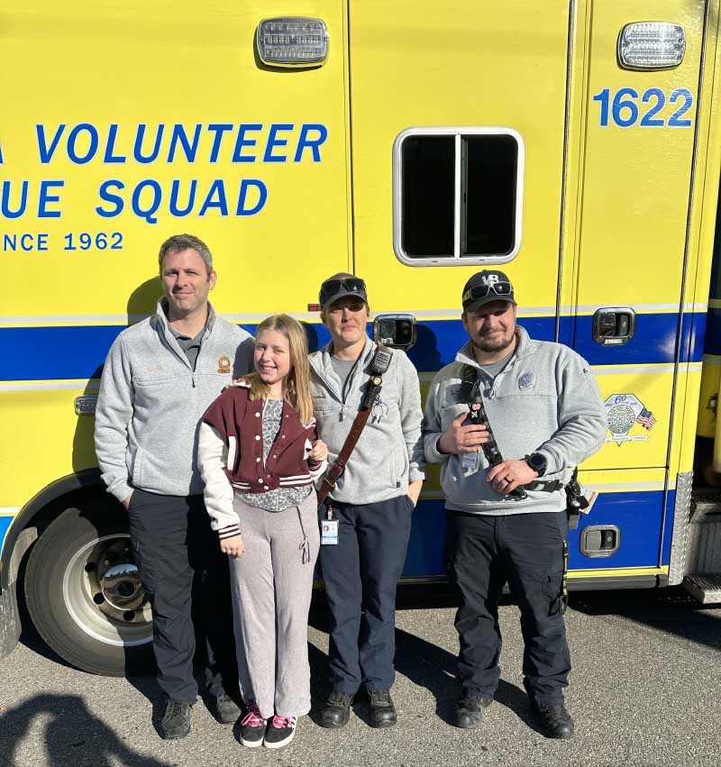 Vada visiting the paramedics who took over CPR from her. (Photo courtesy of Carawan family)