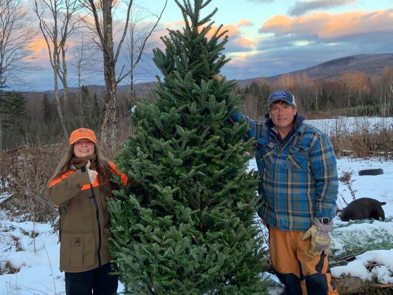 Michael Loughran (right) and his daughter, Sophie, in rural Vermont where Michael and his wife live on a Christmas tree farm. Michael has survived a quadruple bypass and a cardiac arrest. (Photo courtesy of the Loughran family)