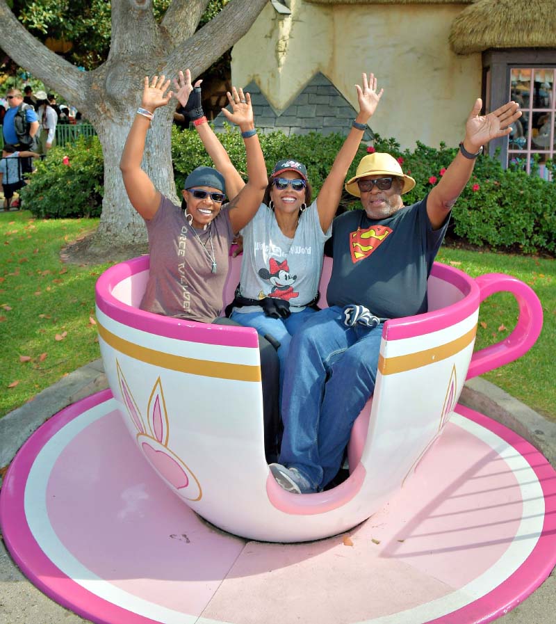 The Moore family enjoying a teacup ride together at an amusement park. (Photo courtesy of the Moore family)