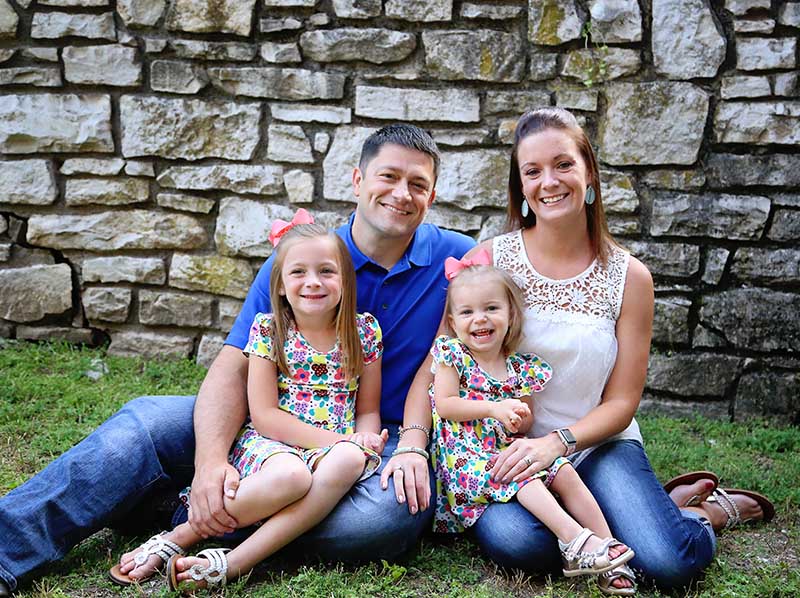 The Scritchfield family in 2019, from left: Maleah, Garrett, Ava and Kayla Scritchfield. (Photo by Heline Photography)