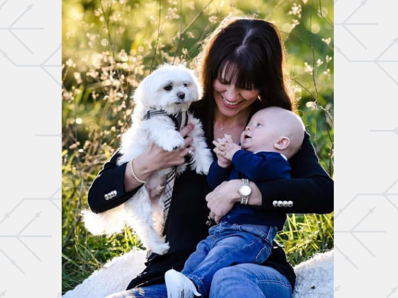 Tess Kossow with her late dog, Mr. Big, and her son, Ferris. (Photo by Lindsay Chan Photography)