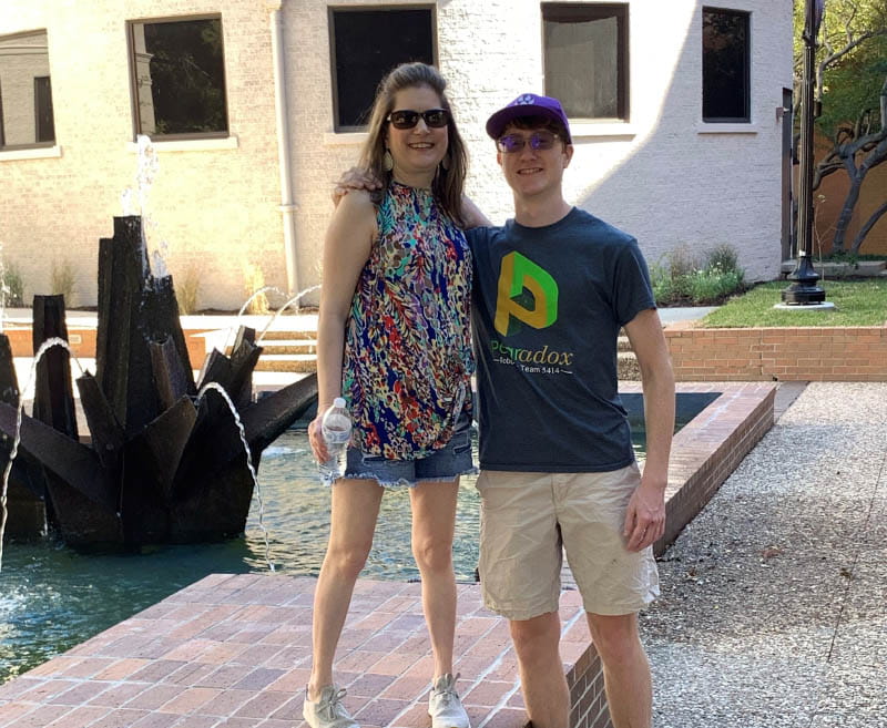 Patti Allbritton (left) with her son, Joshua, walking around the University of Texas at Arlington campus. (Photo courtesy of Patti Allbritton)