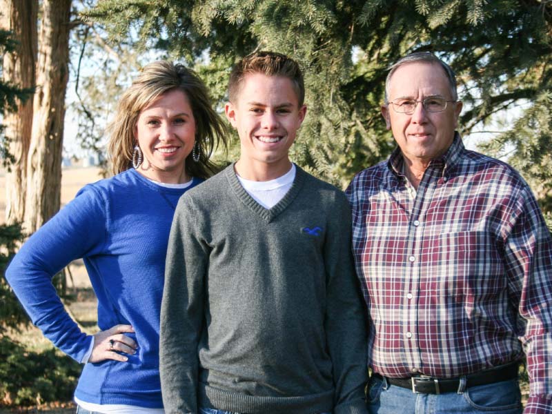 Keri Mathew (left) with her son, Dakota Mathew (middle), and her father, Gary Peterson, in 2013. The three share the same heart valve defect. (Photo courtesy of Kip Mathew)