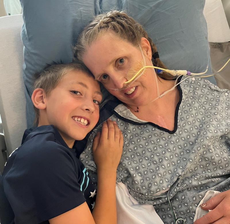 Mindy Beyer recovering in the hospital with her son, Kyler, by her side. (Photo courtesy of Mindy Beyer)