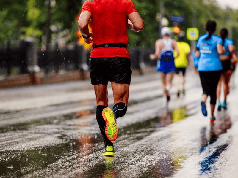 Runners along a street.